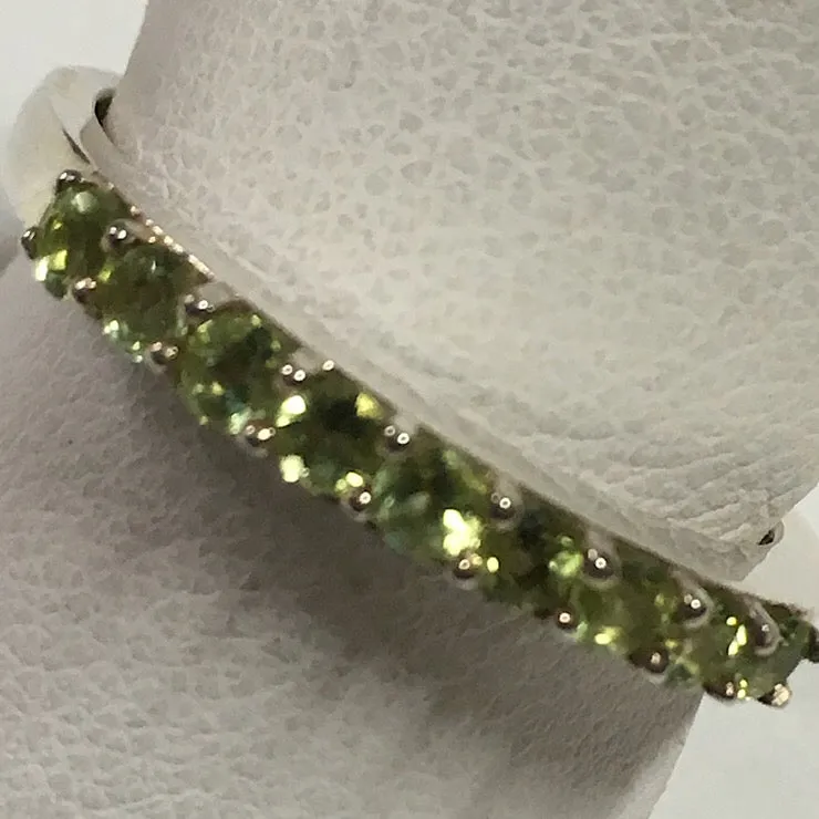 9 STONE PERIDOT RING