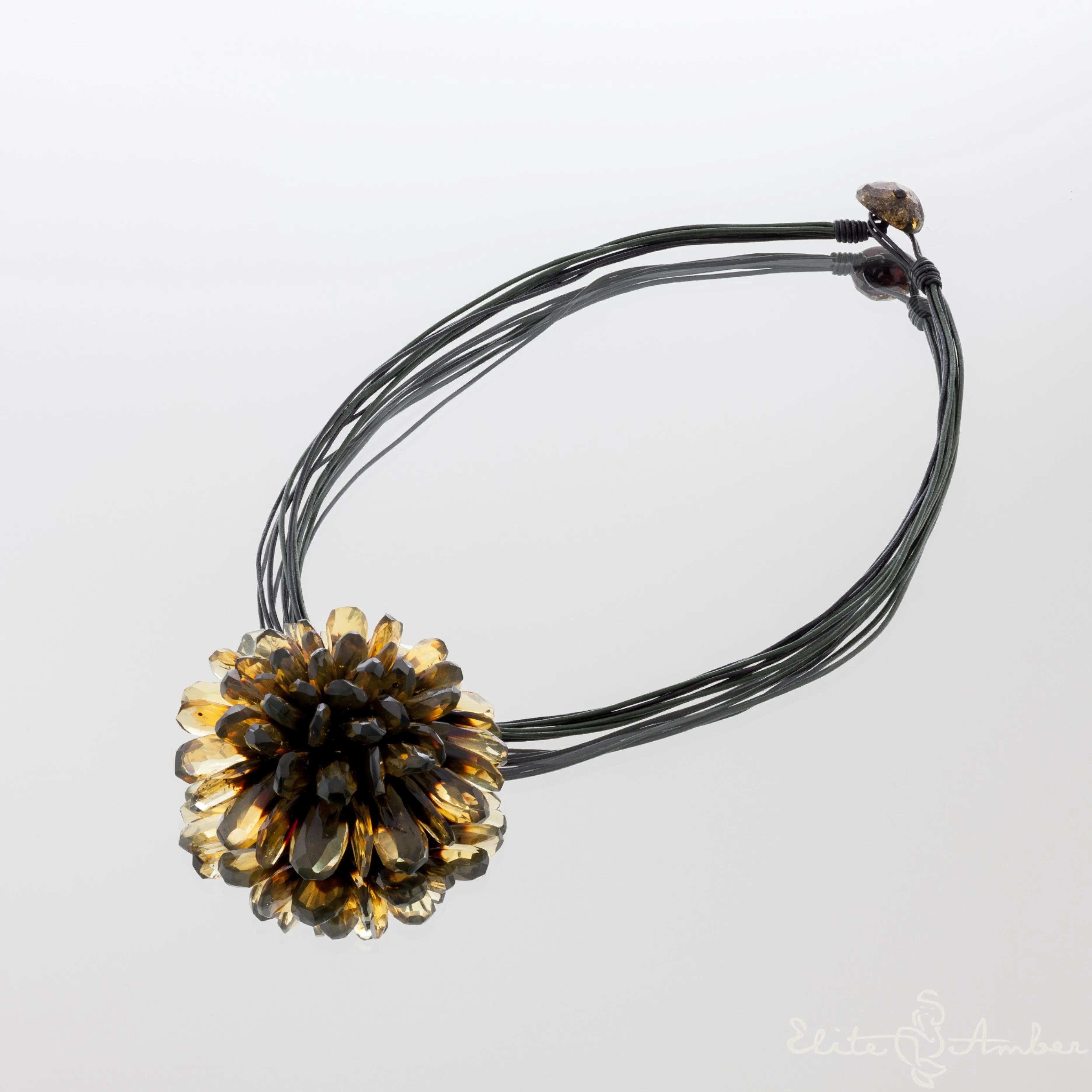 Amber brooch-pendant "Black flower"