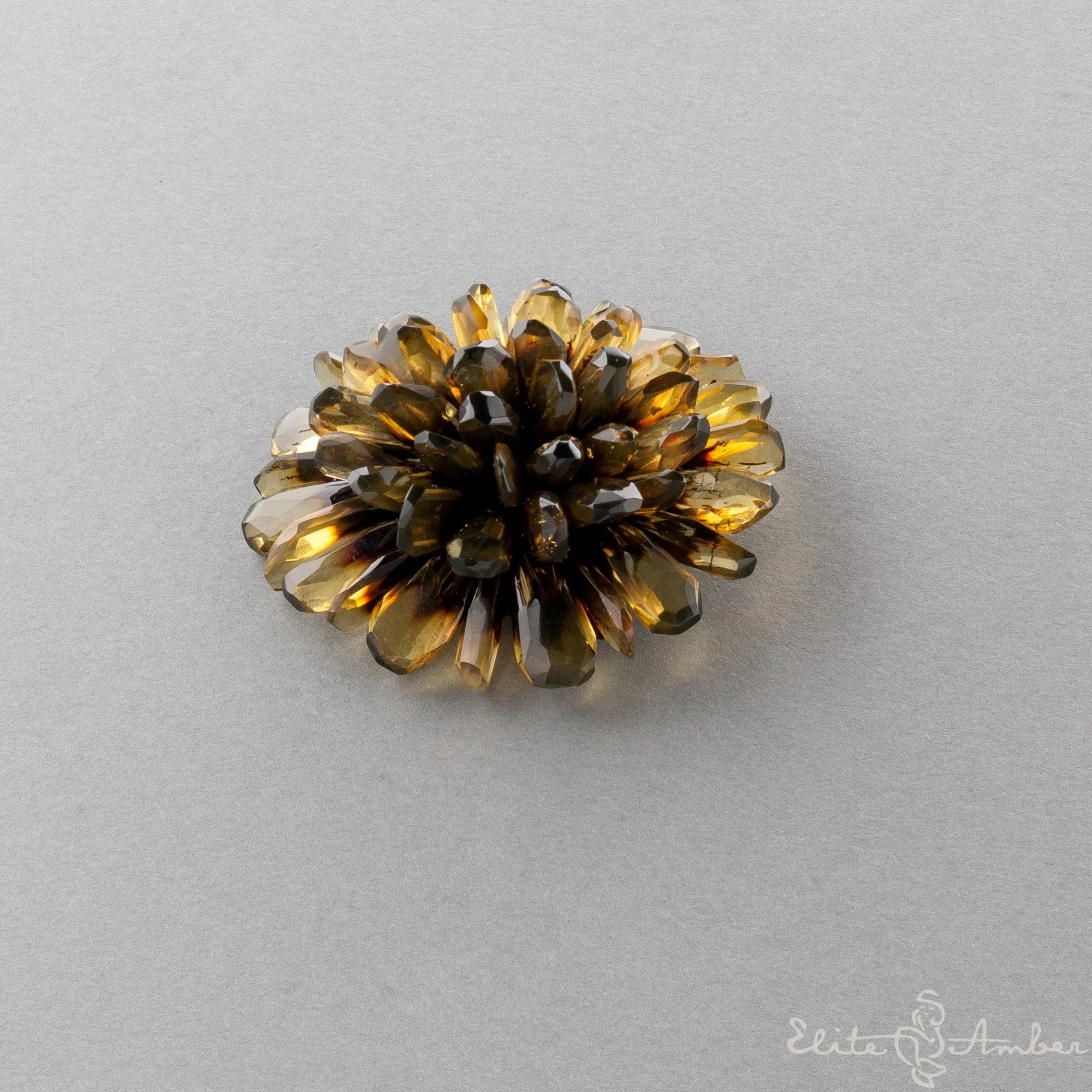 Amber brooch-pendant "Black flower"