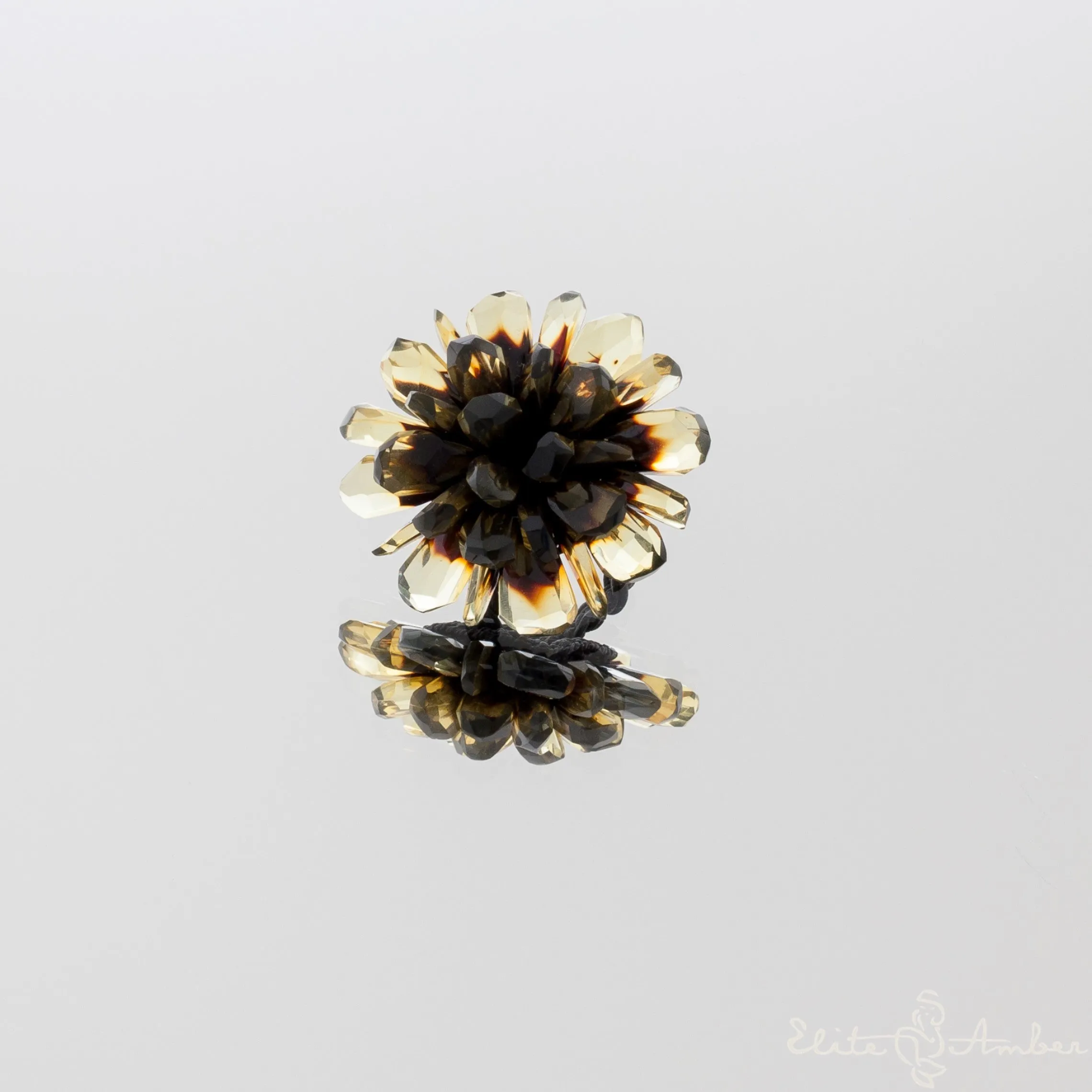 Amber ring "Black flower"