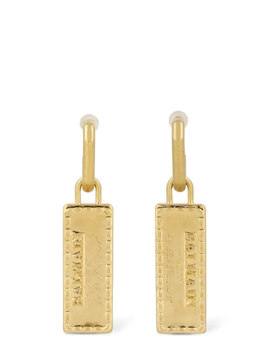 Balmain   Signature tubular brass earrings 