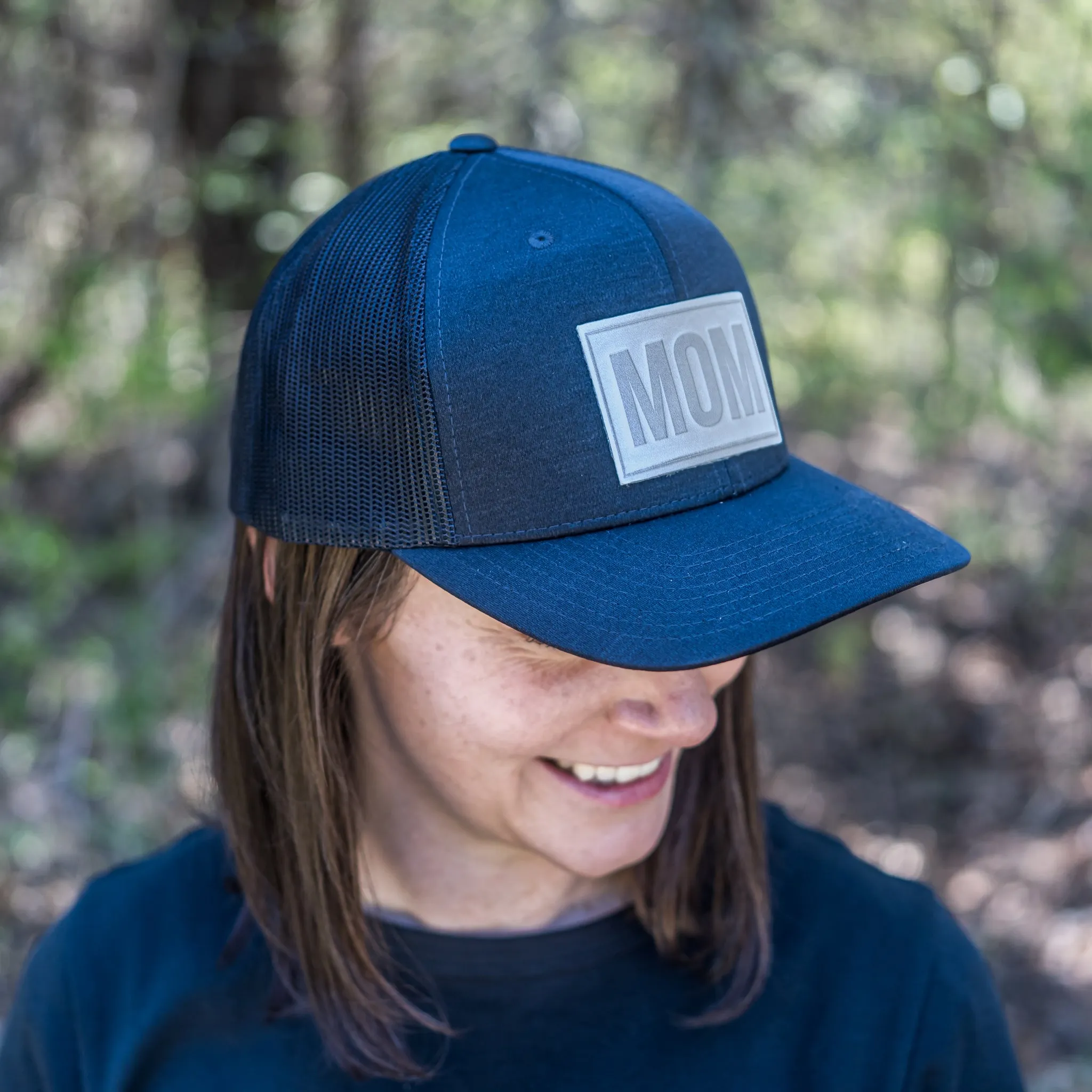 Leather Patch Performance Style Trucker Hat - Mom Stamp - Block Font