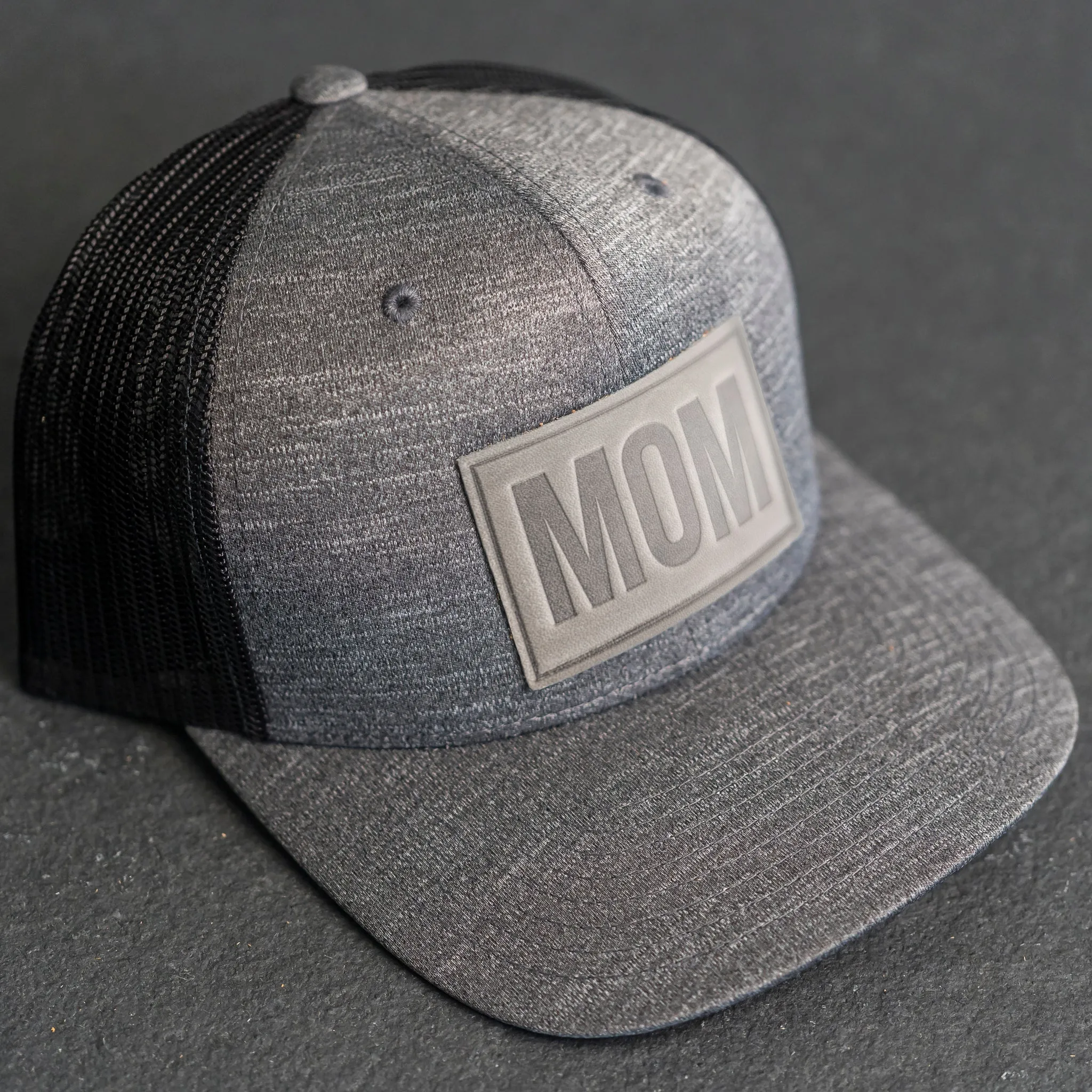 Leather Patch Performance Style Trucker Hat - Mom Stamp - Block Font