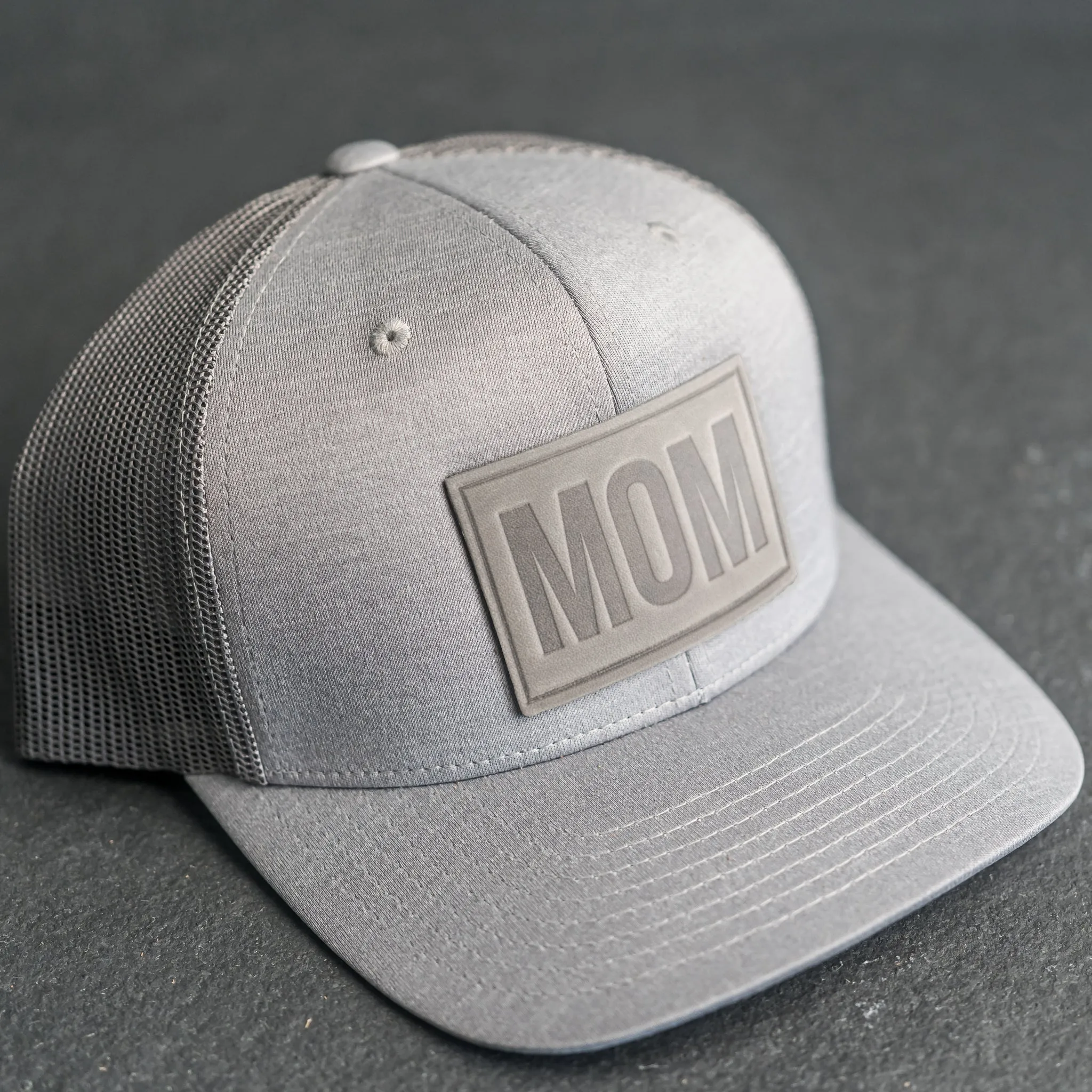 Leather Patch Performance Style Trucker Hat - Mom Stamp - Block Font