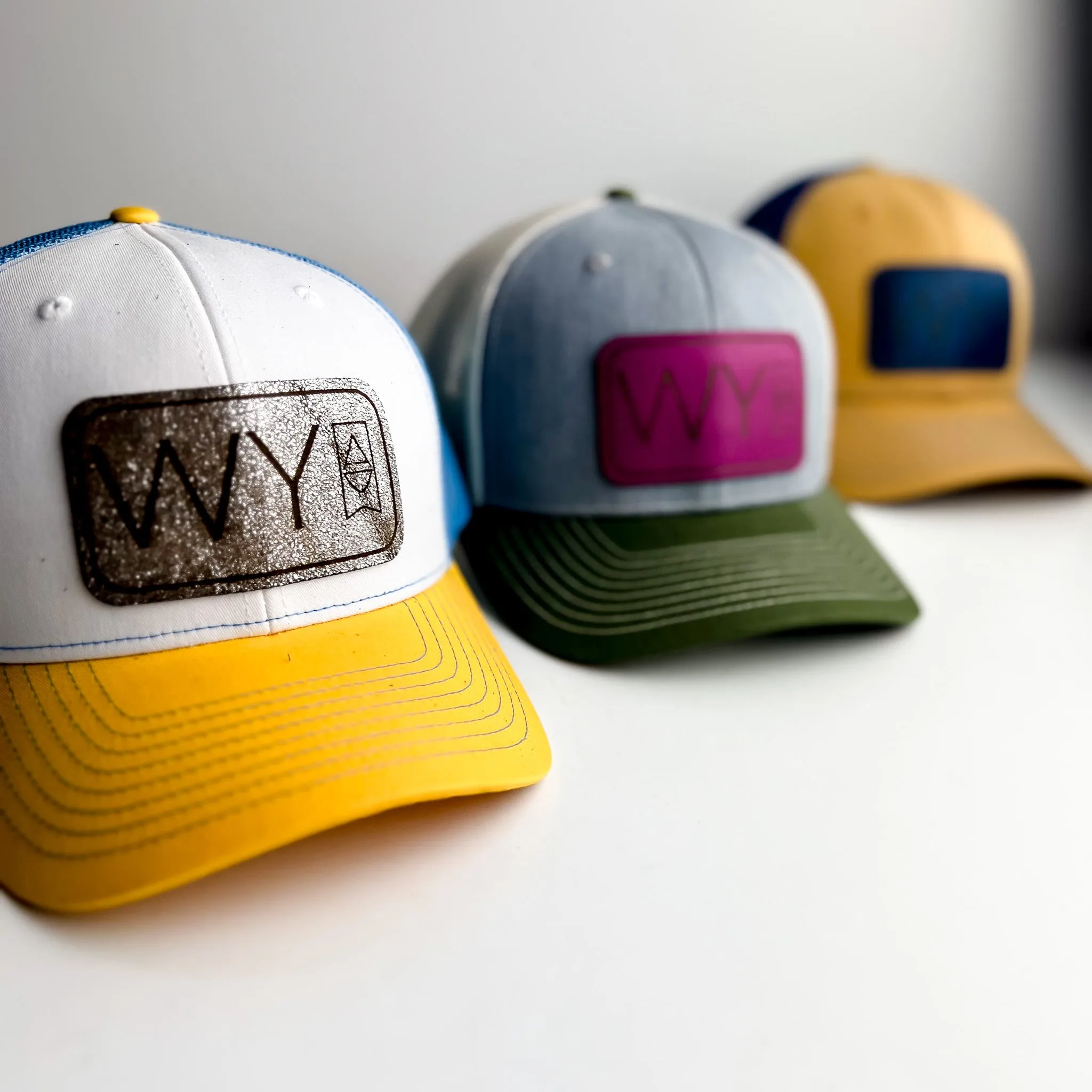 WY Trucker Hat | Gray   Olive   Magenta